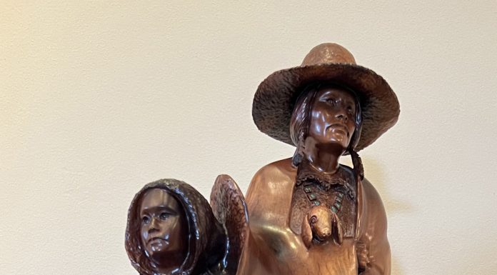 “Family” Bob Boomer Bob Boomer Family Native American Indian man and woman figure figurative western woodcarving close