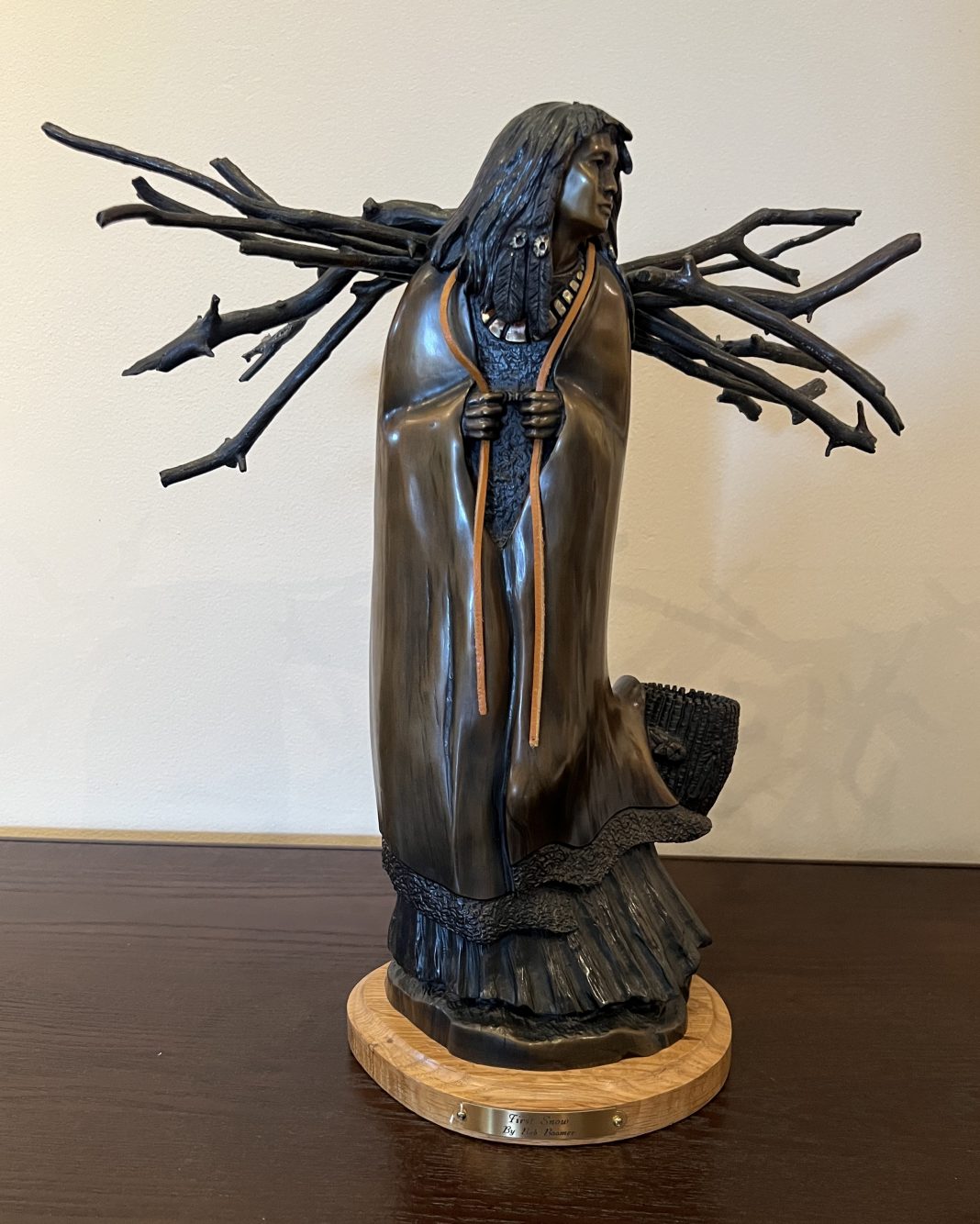 Joe Beeler First Snow Native American Indian figure figurative woman collecting wood western bronze sculpture