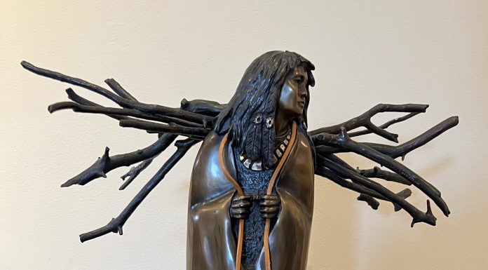 “First Snow” Bob Boomer Joe Beeler First Snow Native American Indian figure figurative woman collecting wood western bronze sculpture
