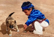 Ray Swanson Pictures In The Sand Native American Indian dog boy figure figurative western oil painting