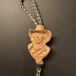 Mehl Lawson Cow Boss bolo tie Prix de West 2005 Cowboy Artists of America western bronze sculpture with cord
