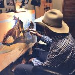 Tom Dorr artist cowboy painting easel paint photo