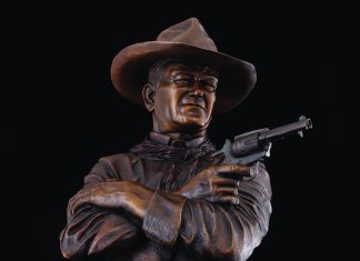 Michael Trcic Out Here A Man Solves His Own Problems John Wayne cowboy pistol firearm gun western bronze sculpture close up