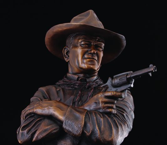 Michael Trcic Out Here A Man Solves His Own Problems John Wayne cowboy pistol firearm gun western bronze sculpture close up